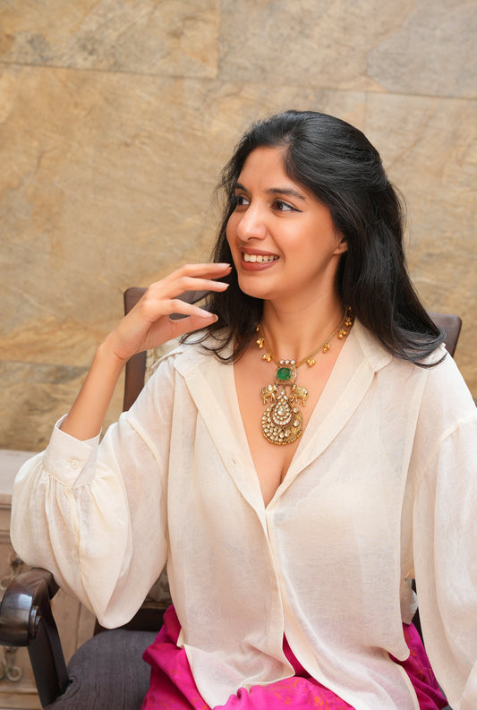 Heritage Antique Gold Hasli Choker with Dual Elephant (Hathi) Motifs, Carved Emerald Stone, and Ornate Polki Chandbali-Style Crescent