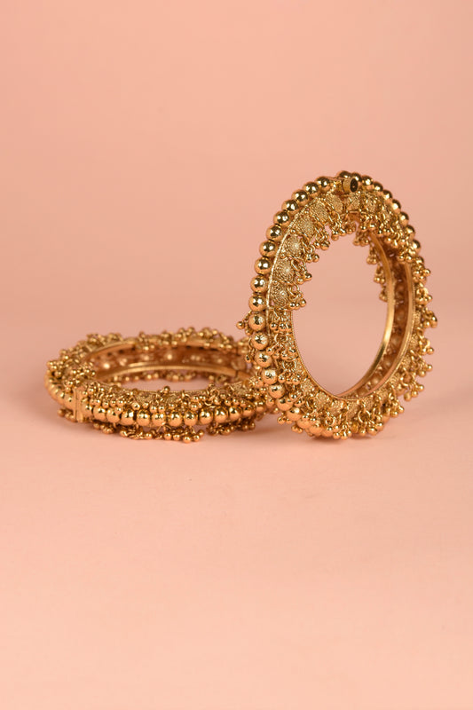 Rani Ghungroo Kada | Gold-Plated Granulated Heritage Bangles with Tiered Ghungroo Clusters (Set of 2)