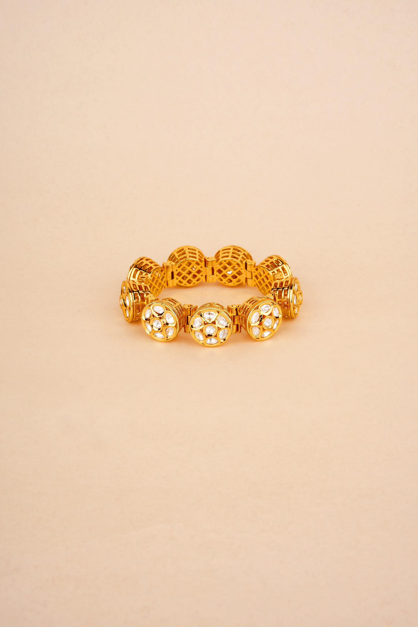 The Polki Cadence - Articulated 22kt Gold-Plated Jali & Segmented Karigari Bracelet