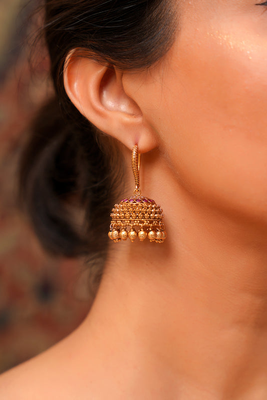 Antique Gold Granulated Jhumka Earrings with Ruby Accents and Ghunghroo — Temple Style