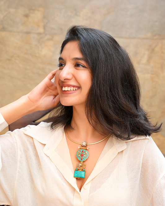 Ancestral Turquoise Kavach Choker – 22 karat Gold-Plated Hasli Necklace with Hand-Carved Shield & Mother of Pearl