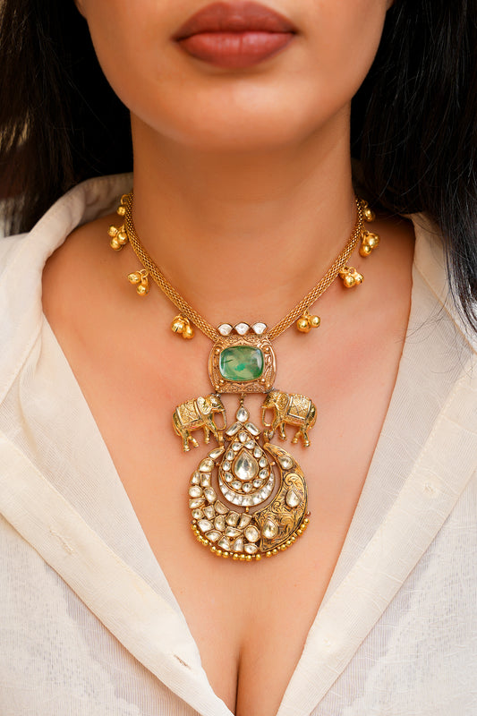 Heritage Antique Gold Hasli Choker with Dual Elephant (Hathi) Motifs, Carved Emerald Stone, and Ornate Polki Chandbali-Style Crescent